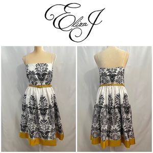 Eliza J black and white A Line belted dress with yellow trim.  Size 12